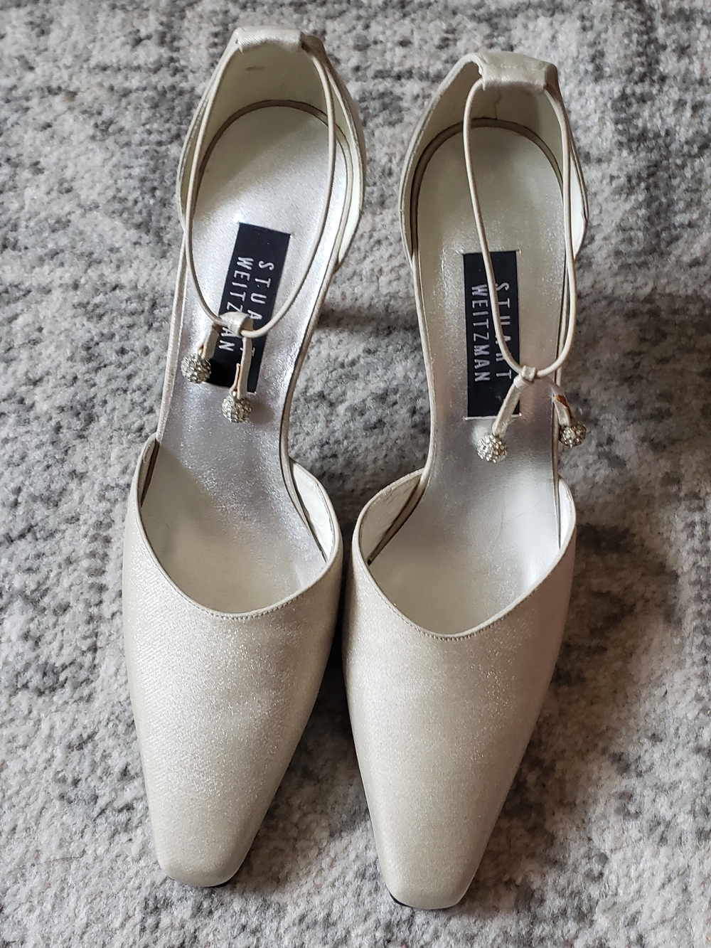 Stuart Weitzman Cream Satin Pointed-Toe Ankle-Strap Pumps with Tassel Accents